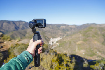 A steadycam with action camera