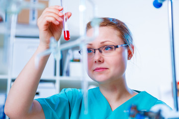 Nurse doing medical analysis
