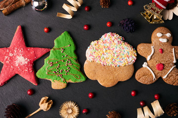 Fototapeta na wymiar Winter Christmas background with gingerbread cookies