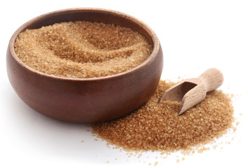 Brown sugar with wooden scoop