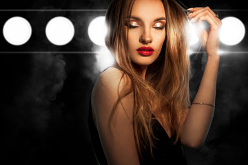 Fototapeta na wymiar portrait of glamour young lady with red lips and closed eyes