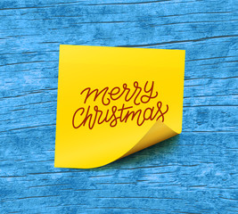 Merry Christmas text on yellow sticky note paper over blue wooden background. Vector illustration