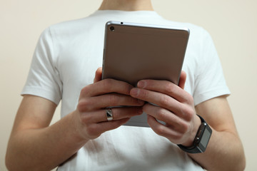 tablet in the hands
