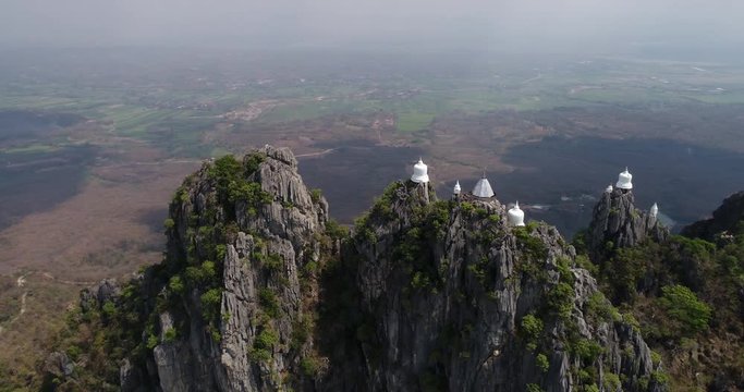 LAMPANG, THAILAND, MARCH 2017: Aerial view over Wat Chalermprakiat, a mountain top Temple in Lampang district, north Thailand.