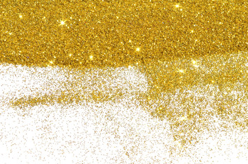 Textured background with golden glitter sparkle on white