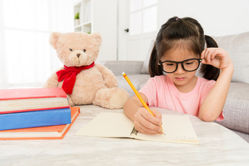 seriously young girl kid student studying english