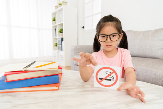 Beauty Girl Kid Showing No Smoking Sign To Camera