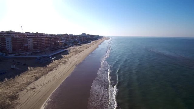 Drone en Matalascañas o Torre de la Higuera, poblacion costera de Almonte en la provincia de Huelva, al suroeste de Andalucía, en España. Video aereo con Drone