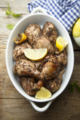 Chicken baked with lemon, oregano and sumac