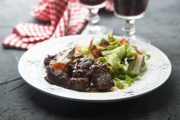 Beef stew with vegetables and red wine