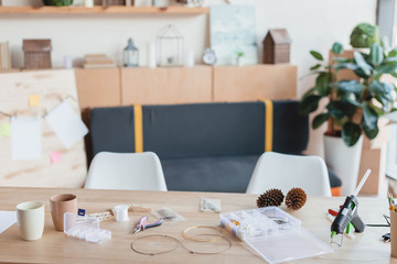 workplace with tools for handmade accessories manufactoring at workshop