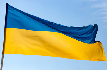 flag of Ukraine against the blue sky