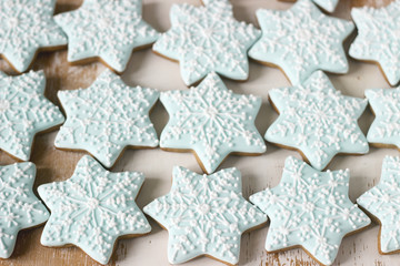 Gingerbread star cookie for Christmas on white background.