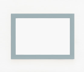 Light  wooden frame for picture hanging on white wall. Blank picture. Template for design