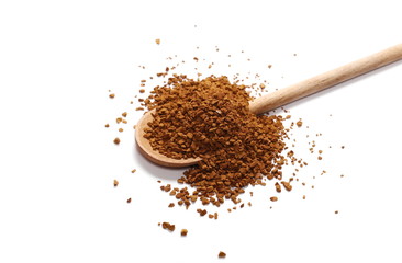 instant coffee grains in wooden spoon isolated on white background and texture