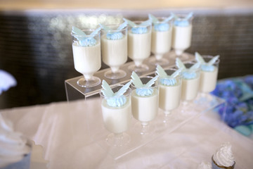 table with cakes and desserts in soft colors