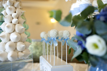 table with cakes and desserts in soft colors
