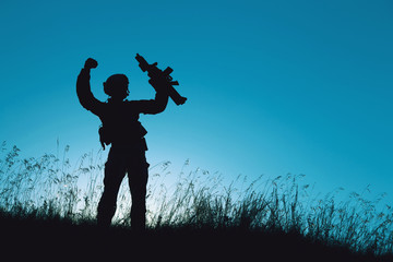 Fototapeta na wymiar military soldier with weapons