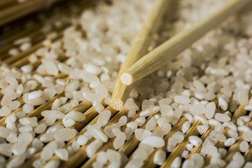sushi mat chopsticks and rice
