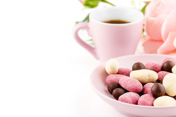 Valentines day background with handmade candies and pink cup of coffee