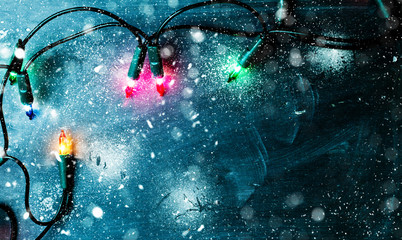 colorful christmas lights on blue background