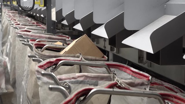 Removing bag from automated parcel sorting system