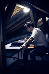 Caucasian businessman working at his desk. Working home.