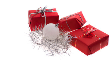 red gifts with silver tinsel