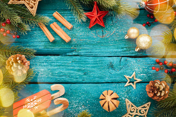 Christmas border with decoration on a wooden board
