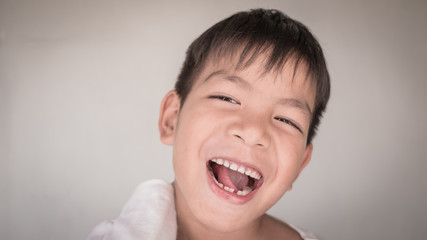 Close up face portrait little young asian boy