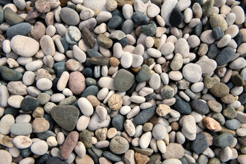Beach stones background. Top view.