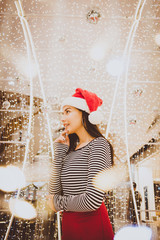 beautiful young woman wearing warm fashionable winter clothes