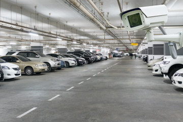 CCTV camera security in Parking garage In the mall for background.