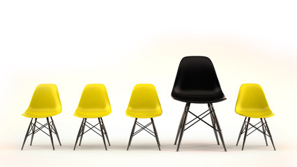 Gelbe Stuhlreihe mit schwarzem großen Stuhl