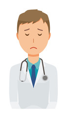 Fototapeta premium A young male doctor wearing a white coat apologizes