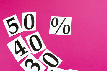 50% sale. numbers on pink background