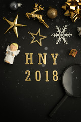 Fototapeta na wymiar Happy new year 2018 holiday background with gold ornaments and decorations. Merry christmas and happy new year greeting card with copy space. New year celebration holiday background.