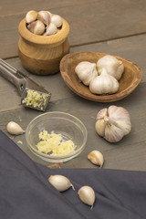 garlic on a wooden kitchen table. 