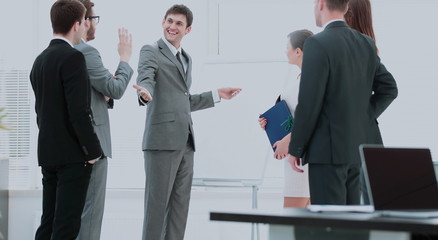 office life. business team discussing a new business plan next t