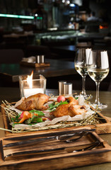 Dinner for two. Quails baked with asparagus and chanterelles