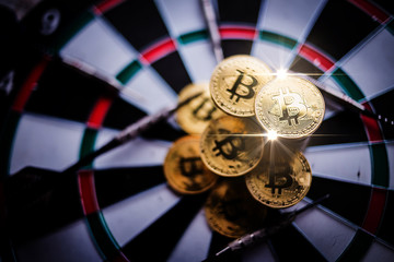 business currency ideas concept bitcoin on dart board with arrow strategy plan concept