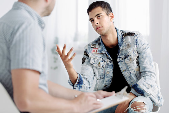 Spanish man in denim jacket