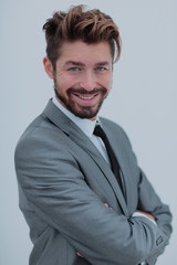 Close up portrait of a smiling handsome business man  over white