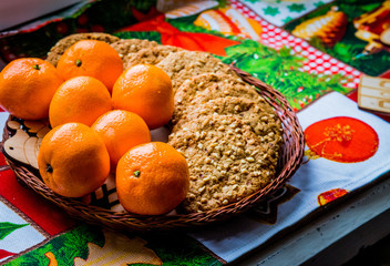 Christmas cookies with tangerines in a basket