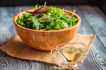 Fresh rustic vegetable salad on rustic background