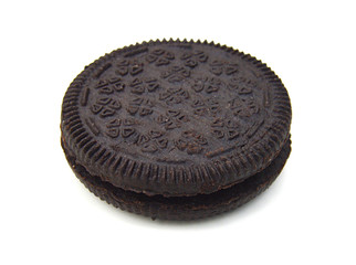 Chocolate cookies with creme filing isolated on white background