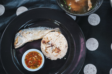 fried mackerel fish with rice and spicy seafood dipping