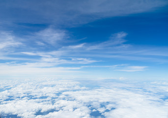 Aerial view of Blue sky and Cloud Top view from airplane window