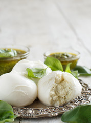 Italian mozzarella cheese stuffed with ricotta and persto