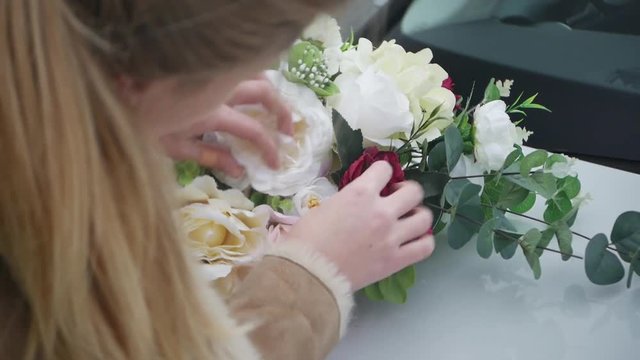 Florist Wedding decoration on a white car